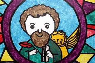Stained‑glass style religious artwork featuring a saint and a lion.